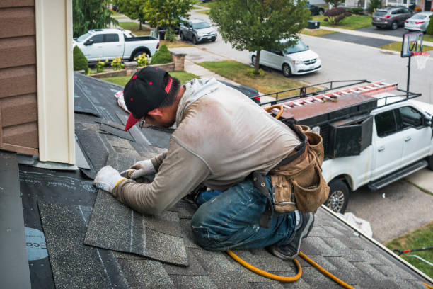 Professional Gutter Repair And Installation technician working in Washington Mills, NY